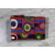 Cartera pell vermella cercles